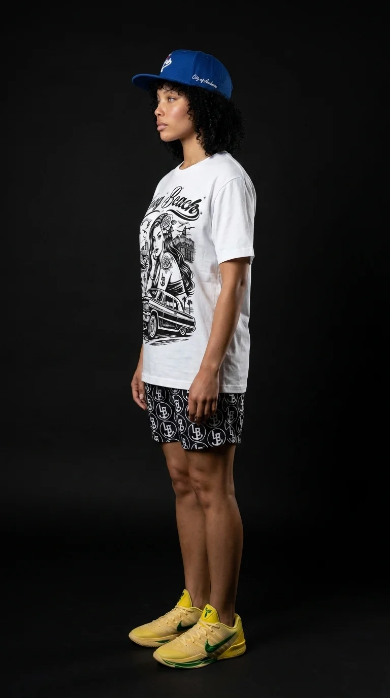 AI lookbook — Long Beach graphic tee left side view, LB monogram shorts, yellow sneakers, dark background